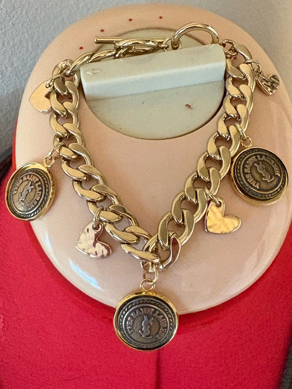 Authentic YSL charms on unbranded bracelet chain with toggle clasp